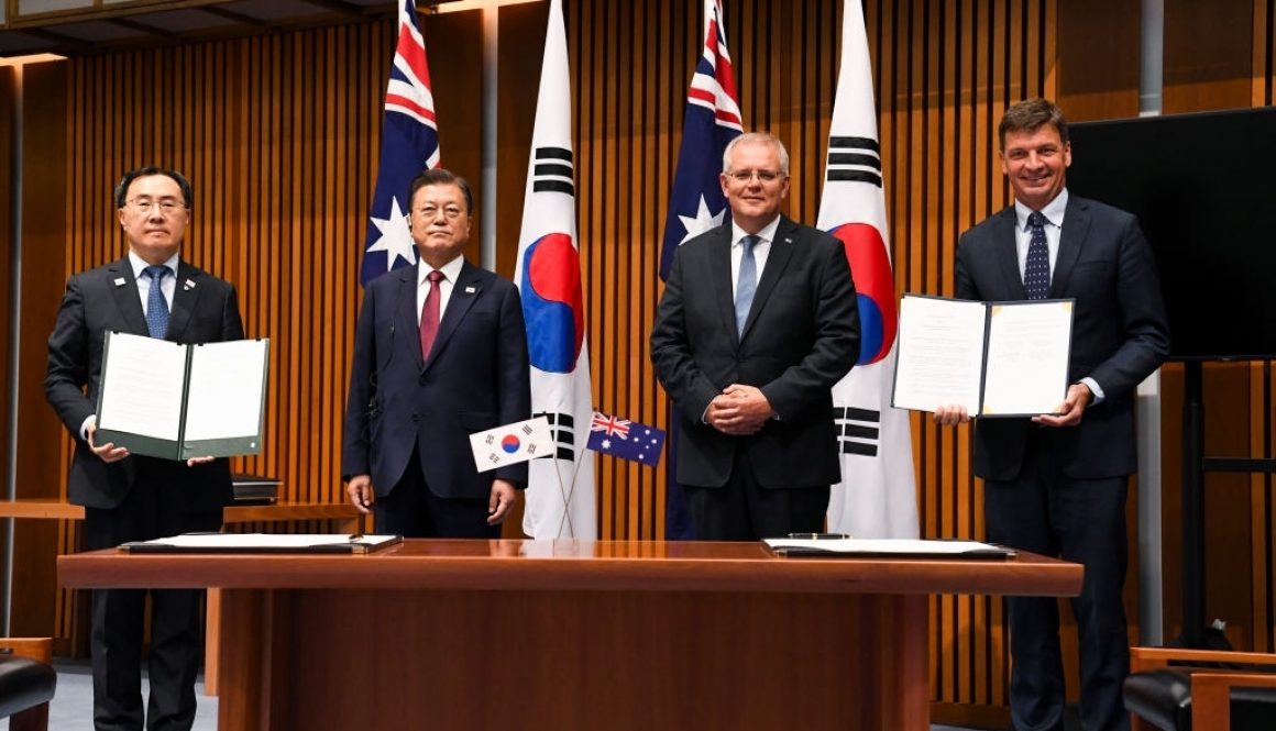 CANBERRA, AUSTRALIA - DECEMBER 13: Australian Prime Minister Scott Morrison (2nd R) and South Korean President Moon Jae-in (2nd L) pose for photographs with South Korean Trade Minister Yeo Han-koo (L) and Australian Energy Minister Angus Taylor (R) at Parliament House on December 13, 2021 in Canberra, Australia. President of the Republic of Korea Moon Jae-in and First Lady Kim Jung-sook are on a four-day visit to Australia. 2021 marks the 60th anniversary of diplomatic relations between Australia and the Republic of Korea. (Photo by Lukas Coch - Pool/Getty Images)