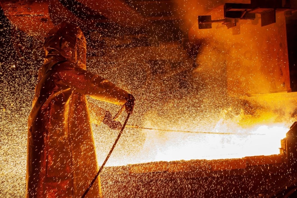This picture taken on March 30, 2019 shows a worker manning a furnace during the nickel smelting process at Indonesian mining company PT Vale's smelting plant in Soroako, South Sulawesi. - Indonesia's surprise plan to roll out a nickel-ore export ban two years early could scare foreign investors away from Southeast Asia's biggest economy, analysts say, as it cements a reputation for policy flip-flops. - TO GO WITH Indonesia-mining-economy-politics,FOCUS by Peter Brieger (Photo by Bannu MAZANDRA / AFP) / TO GO WITH Indonesia-mining-economy-politics,FOCUS by Peter Brieger (Photo by BANNU MAZANDRA/AFP via Getty Images)