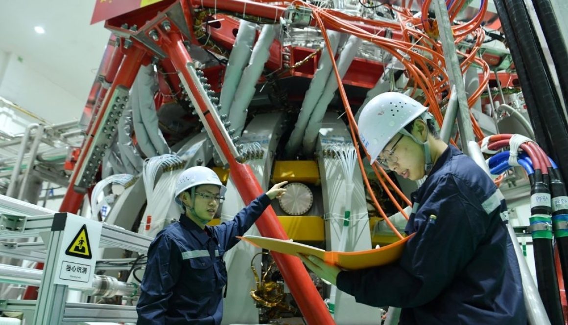 Technical personnel checks the Chinas HL-2M nuclear fusion device, known as the new generation of "artificial sun", at a research laboratory in Chengdu, in eastern China's Sichuan province on December 4, 2020. - China successfully powered its "artificial sun" nuclear fusion reactor for the first time, state media reported on December 4, marking a great advance in the country's nuclear power research capabilities. (Photo by STR / AFP) / China OUT (Photo by STR/AFP via Getty Images)