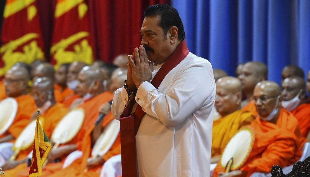 Sri Lanka's new Prime Minister Mahinda Rajapaksa looks on during a ceremony to formally assume duties for the next five-year term, at the Prime Minister's official residence in Colombo on August 11, 2020. - The alliance of Rajapaksa, 74, won a two-thirds majority at the August 5 parliamentary elections consolidating his brother Gotabayas presidential election victory in November and allowing the brothers to tighten their grip on power. (Photo by Ishara S. KODIKARA / AFP) (Photo by ISHARA S. KODIKARA/AFP via Getty Images)