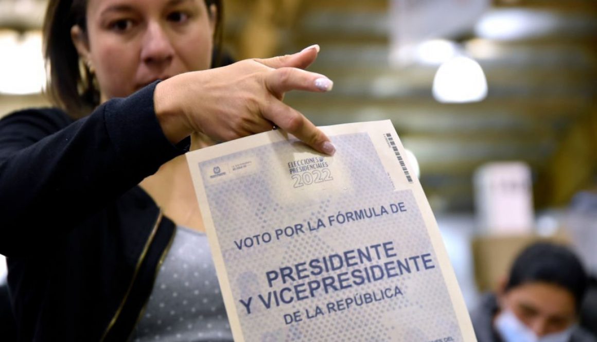 BOGOTA, COLOMBIA - MAY 29: A Colombian citizen holds the electoral card to cast her vote during the presidential election day on May 29, 2022 in Bogota, Colombia. (Photo by Guillermo Legaria/Getty Images)
