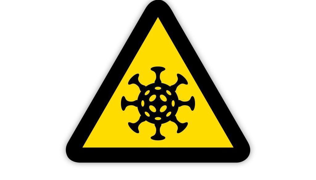 Simbol Ikon Virus Menular Untuk Peringatan Penyakit Menular Pandemi Dan Berbahaya (Ilustrasi Stok via Getty Images)