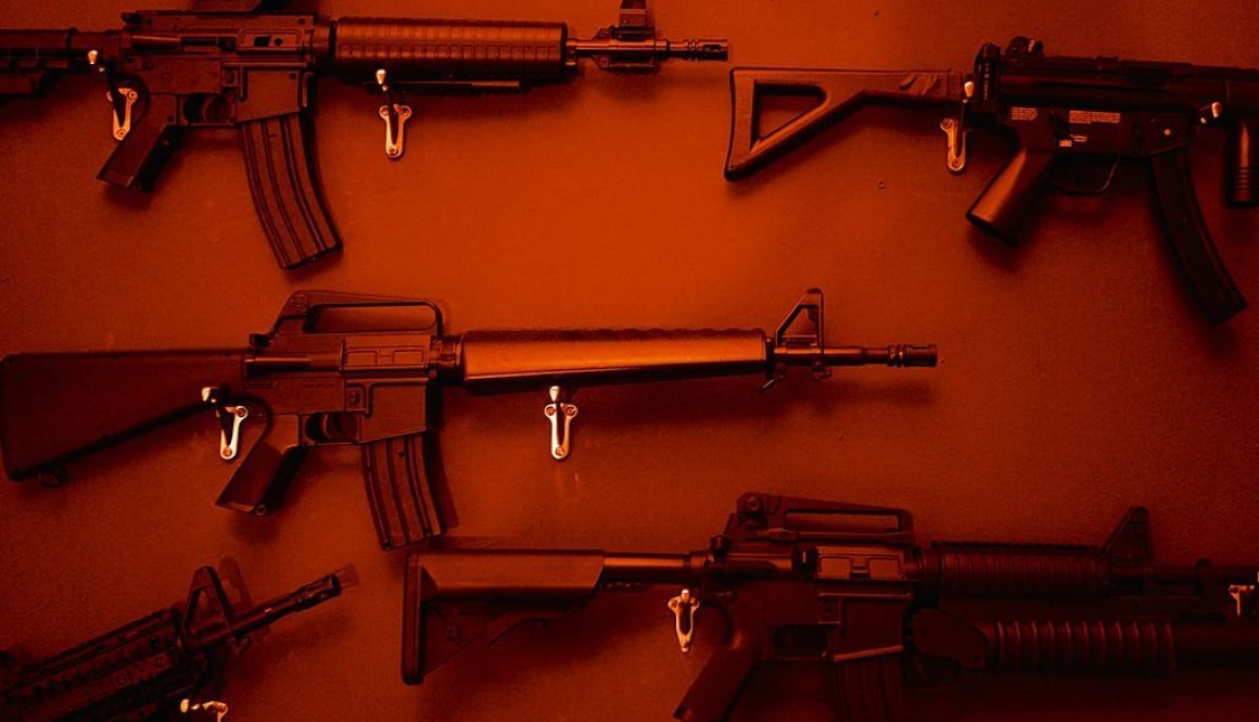 Numerous Assault Rifles Hanging On Wall (Stock Photo via Getty Images)