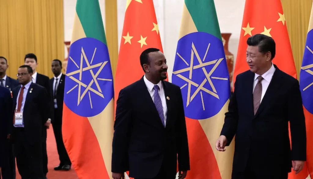 Ethiopia's Prime Minister Abiy Ahmed and China's President Xi Jinping talk debt and development. Andy Wong/Pool via REUTERS