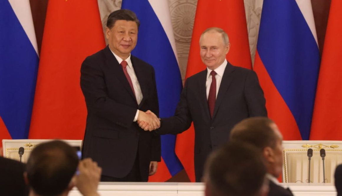 Chinese President Xi Jinping (L) and Russian President Vladimir Putin (R) shake hands during the signing ceremony at the Grand Kremlin Palace, on March 21, 2023, in Moscow, Russia. (Photo by Contributor/Getty Images)