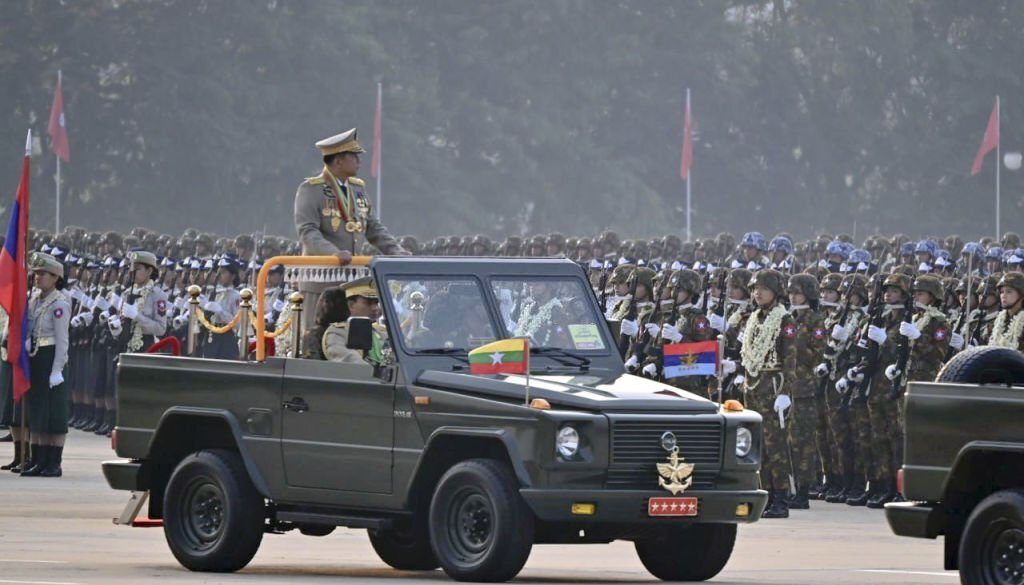 Myanmar's junta chief Senior Gen. Min Aung Hlaing inspects troops during an annual military parade in the country's administrative capital of Naypyitaw on March 27, 2023. (Photo by Kyodo News via Getty Images)