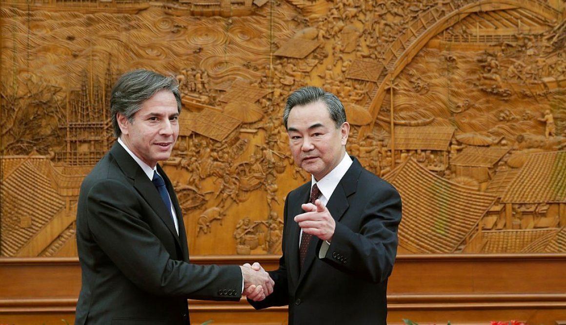 BEIJING, CHINA - FEBRUARY 11: (L-R) U.S. Deputy Secretary of State Antony Blinken shakes hand with Chinese Foreign Minister Wang Yi at the Olive Hall before a meeting at the Foreign Ministry office on February 11, 2015 in Beijing, Australia. (Photo by Andy Wong - Pool/Getty Images)