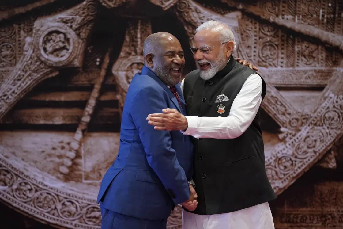 Indian Prime Minister Narendra Modi, right, meets African Union Chairman and president of the Comoros, Azali Assoumani, upon his arrival at the Bharat Mandapam convention centre for the G20 Summit in New Delhi, India, on Saturday.Evan Vucci / AP