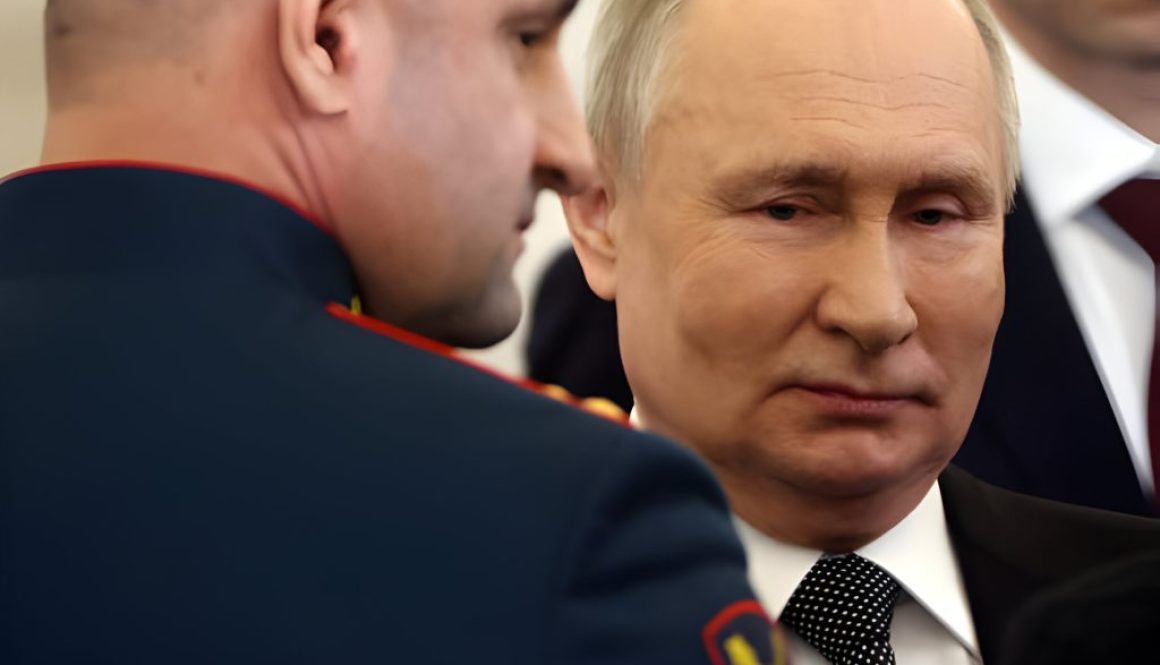 Russian President Vladimir Putin (R) talks to Ukrainian-born Russian military officer Artem Zhoga (L) during the award ceremony, marking the Heroes of Russia Day on December 8, 2023, in Moscow, Russia. Putin said after the ceremony, that he will run for the president again in 2024 elections. (Photo by Contributor/Getty Images)