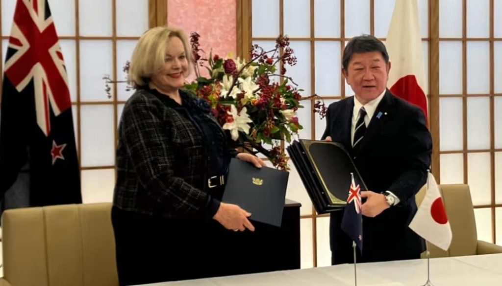 New Zealand Defense Minister Judith Collins, left, and Japan Foreign Minister Toshimitsu Motegi at the ACSA signing in Tokyo on Dec. 19