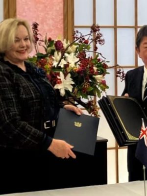 New Zealand Defense Minister Judith Collins, left, and Japan Foreign Minister Toshimitsu Motegi at the ACSA signing in Tokyo on Dec. 19