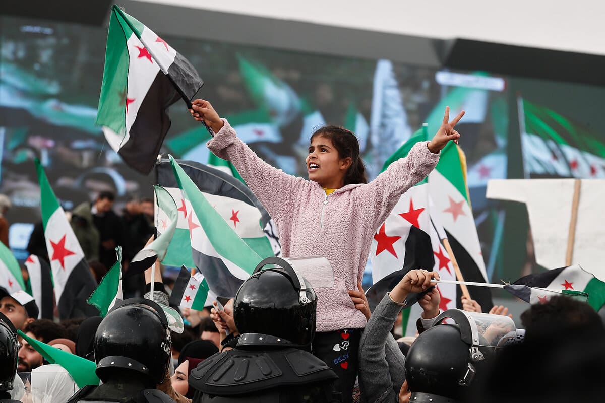 Syrian people celebrating the fall of Assad
