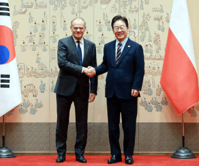 Polish Prime Minister Donald Tusk and South Korean President Lee Jae Myung pose for photographs before their meeting at the Presidential Blue House in Seoul, South Korea, April 13, 2026.